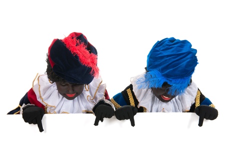Dutch black petes for typical Sinterklaas holidays with white boardの写真素材