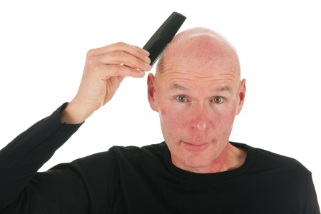 Portrait adult bald man with black shirt in studioの写真素材