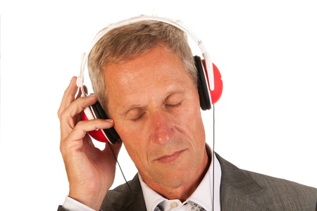 Senior man is listening to music