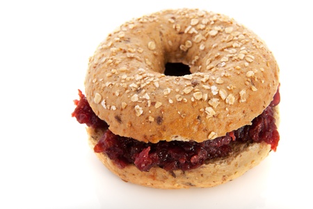 Bread bun with sweet jam isolated over white backgroundの写真素材