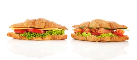 Croissants with cheese, salmon lettuce and tomatoesの写真素材