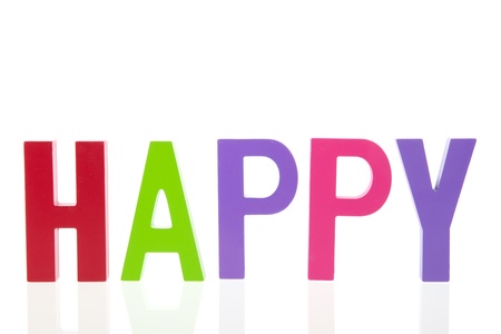 colorful word happy isolated over white backgroundの写真素材