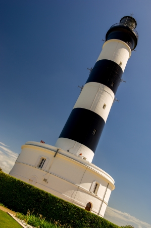 Island D'Oleron in the French Charente with striped lighthouseの写真素材