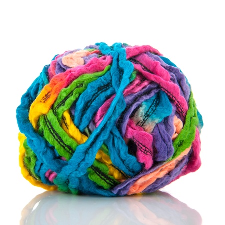 Modern ball wool in many colors isolated over white backgroundの写真素材