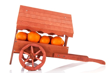 Wooden market stall with fresh tangerines isolated over white backgroundの写真素材