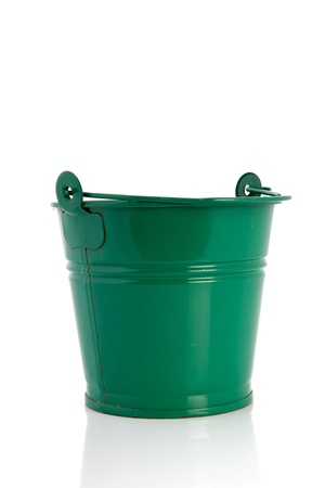 Green metal bucket isolated over white backgroundの写真素材