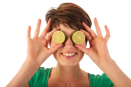summer girl with fresh slices of lemonの写真素材