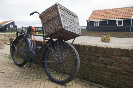 Typical old Dutch transport bike with big basketの写真素材