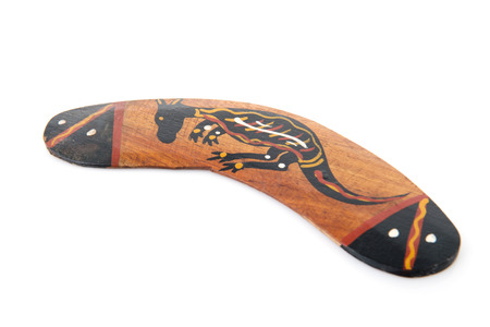 Wooden Australian boomerang isolated over white backgroundの写真素材