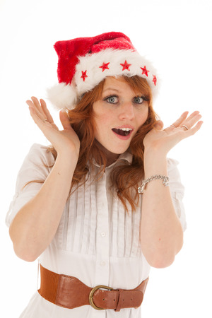 portrait woman with red Santa Claus hat isolated over white backgroundの写真素材