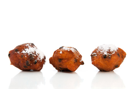 Dutch traditional oliebollen isolated over white の写真素材