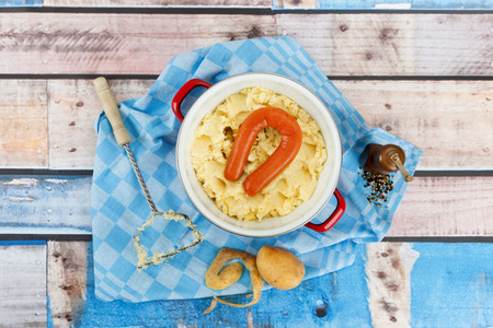 Typical Dutch sauerkraut on checked cloth and wooden undergroundの写真素材