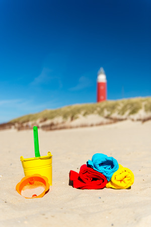 Texel Dutch wadden island with lighthouse and toysの写真素材