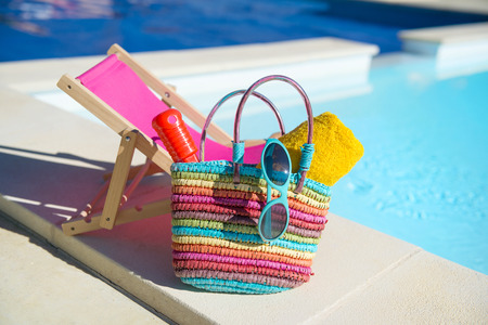 Vacation with chair and towels at the swimming poolの写真素材
