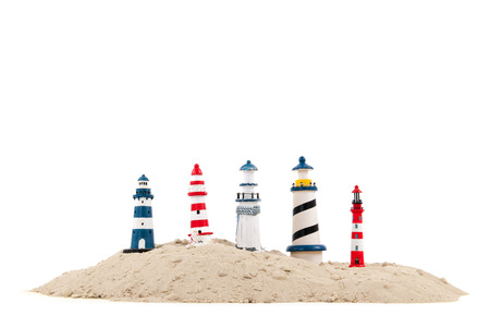 Many lighthouses at the beach isolated over white backgroundの写真素材