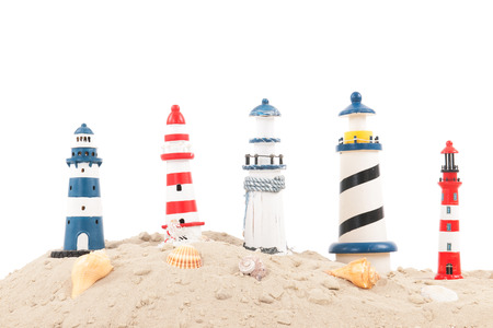 Many lighthouses at the beach isolated over white backgroundの写真素材