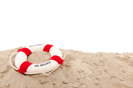 Life buoy wih welcome on board at the beachの写真素材