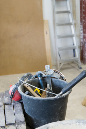 Bucket full with work tools for constructionの写真素材