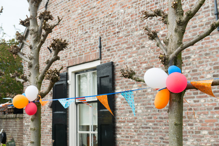 Balloons and flags for kingsday in Hollandの写真素材