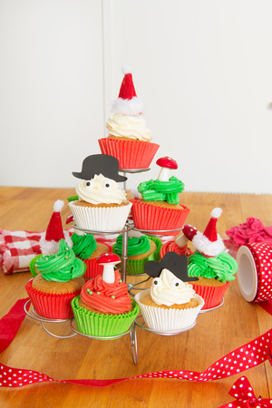 Baking cupcakes for Christmasの写真素材