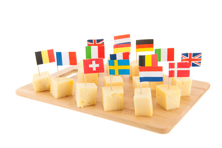 Tray with European cheese cubes with flagsの写真素材