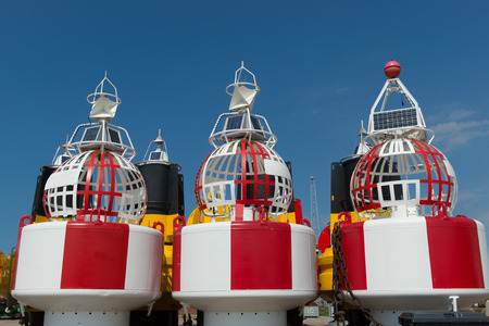 Colorful buoys in stock at the Dutch wadden island Terschellingの写真素材