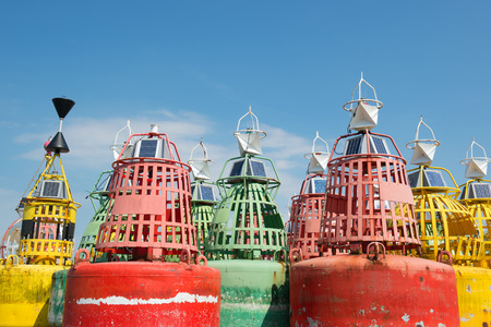 Colorful buoys for navigation in the seaの写真素材