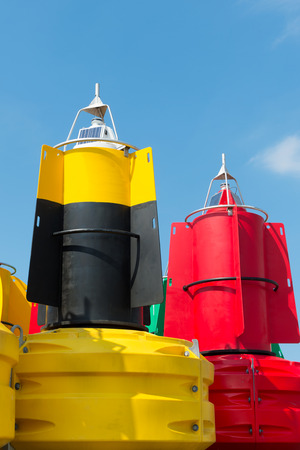 Colorful buoys for navigation in the seaの写真素材