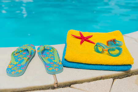 Summer vacation at the swimming poolの写真素材