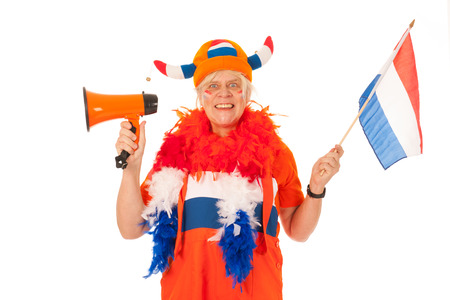 Senior female Dutch soccere supporter isolated over white backgroundの写真素材