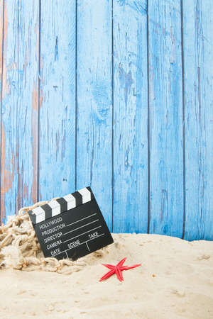 Clapboard from movie at the beachの写真素材