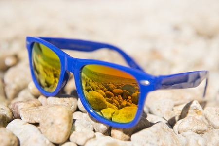 Beach landscape in sunglasses on vacationの写真素材