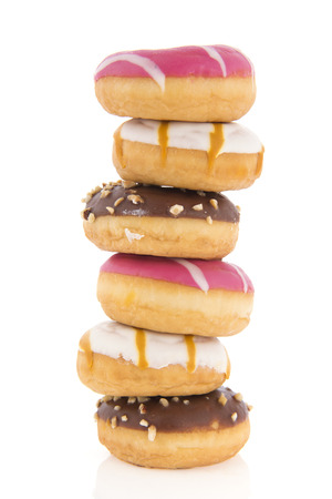 Six donuts in pink, white and chocolateの写真素材