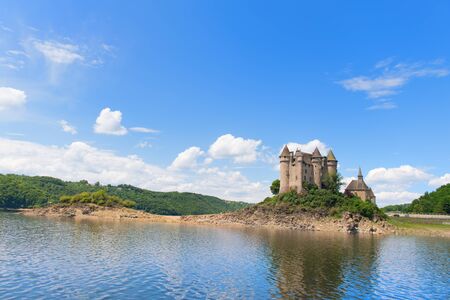 LANOBRE, FRANCE - MAY 24, 2018: Chateau de Val in artificial lake in Lanobre on May 24, 2018のeditorial素材