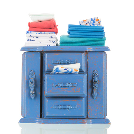 old vintage blue cabinet with lining isolated over white backgroundの写真素材