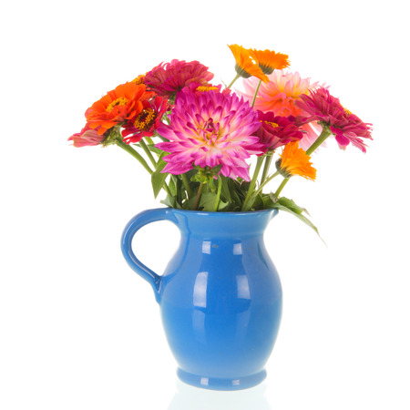 Vase colorful zinnias and Dahlias isolated over white backgroundの写真素材