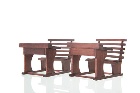 Old furniture from vintage classroom isolated over white backgroundの写真素材