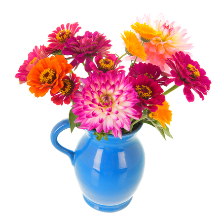 Vase colorful zinnias and Dahlias isolated over white backgroundの写真素材