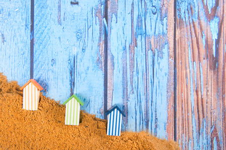 Beach huts in sand at the beachの写真素材
