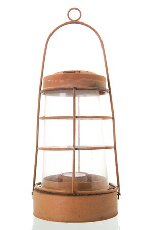 Used red vintage lantern isolated over whiteの写真素材