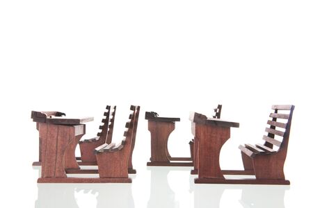 Old furniture from vintage classroom isolated over whiteの写真素材