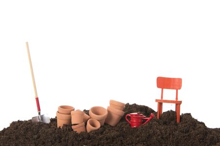 Gardening with black earth flower pots and shovelの写真素材