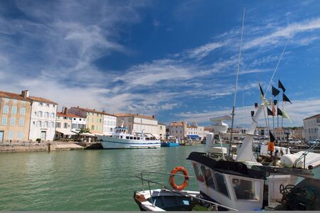 Harbor St Martin de Re in summer with boatsの写真素材