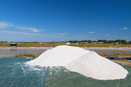 Ile de Re salt lakes and big heap saltの写真素材