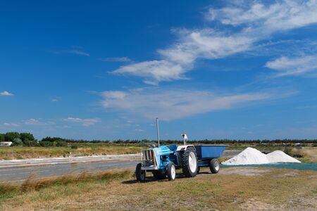 Ile de Re salt lakes and tractorの写真素材