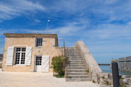 The harbor house in front of the sea of St. Martin de Reの写真素材
