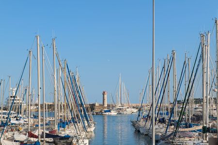 Luxury sail boats at pier in harbourの写真素材