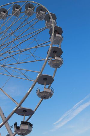 Ferris wheel at fun fairの写真素材