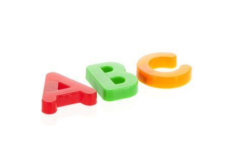 ABV alphabet in red green and yellow isolated over white backgroundの写真素材