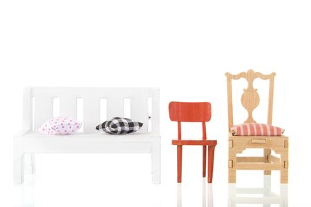 Bench and chairs in a row isolated over white backgroundの写真素材